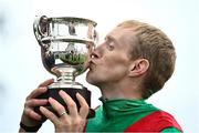 26 June 2022; Jockey Billy Lee celebrates with the cup after winning the Alwasmiyah Pretty Polly Stakes on La Petite Coco during day three of the Dubai Duty Free Irish Derby Festival at The Curragh Racecourse in Kildare. Photo by David Fitzgerald/Sportsfile