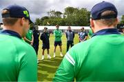26 June 2022; The Ireland team huddle before the LevelUp11 First Men's T20 International match between Ireland and India at Malahide Cricket Club in Dublin. Photo by Ramsey Cardy/Sportsfile