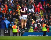 26 June 2022; Matthew Tierney and Robert Finnerty, 13, of Galway celebrate Matthew scoring the last penalty during the GAA Football All-Ireland Senior Championship Quarter-Final match between Armagh and Galway at Croke Park, Dublin. Photo by Ray McManus/Sportsfile