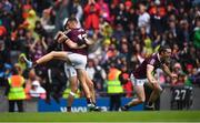 26 June 2022; Matthew Tierney and Robert Finnerty, 13, of Galway and Kieran Molloy, right, celebrate Matthew scoring the last penalty during the GAA Football All-Ireland Senior Championship Quarter-Final match between Armagh and Galway at Croke Park, Dublin. Photo by Ray McManus/Sportsfile