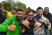 26 June 2022; Supporters during a rain delay at the LevelUp11 First Men's T20 International match between Ireland and India at Malahide Cricket Club in Dublin. Photo by Ramsey Cardy/Sportsfile