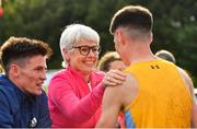 26 June 2022; Darragh McElhinney of UCD AC, Dublin, is congratulated by his mother Breda after winning the men's 5000m during day two of the Irish Life Health National Senior Track and Field Championships 2022 at Morton Stadium in Dublin. Photo by Sam Barnes/Sportsfile