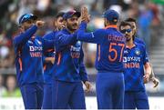 26 June 2022; India players celebrate the wicket of Paul Stirling, taken by Deepak Hooda of India, during the LevelUp11 First Men's T20 International match between Ireland and India at Malahide Cricket Club in Dublin. Photo by Ramsey Cardy/Sportsfile