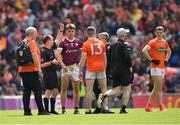 26 June 2022; The two captains, Seán Kelly of Galway and Aidan Nugent of Armagh, are issued with red cards before the start of extra time after a melee as the teams went to the dressing rooms at full time at the GAA Football All-Ireland Senior Championship Quarter-Final match between Armagh and Galway at Croke Park, Dublin. Photo by Ray McManus/Sportsfile