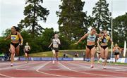 26 June 2022; Sophie Becker of Raheny Shamrock AC, Dublin, second from right, dips for the line to win the women's 400m, ahead of Phil Healy of Bandon AC, Cork, left, who finished second, during day two of the Irish Life Health National Senior Track and Field Championships 2022 at Morton Stadium in Dublin. Photo by Sam Barnes/Sportsfile