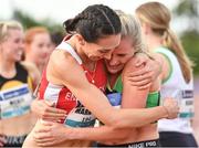 26 June 2022; Carla Sweeney of Rathfarnham WSAF AC, Dublin, right, is congratulated by Niamh Margarete Markham of Ennis Track AC, Clare, after winning the women's 1500m during day two of the Irish Life Health National Senior Track and Field Championships 2022 at Morton Stadium in Dublin. Photo by Sam Barnes/Sportsfile