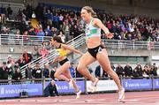 26 June 2022; Sophie Becker of Raheny Shamrock AC, Dublin, right, dips for the line to win the women's 400m, ahead of Phil Healy of Bandon AC, Cork left, who finished second, during day two of the Irish Life Health National Senior Track and Field Championships 2022 at Morton Stadium in Dublin. Photo by Sam Barnes/Sportsfile