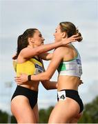 26 June 2022; Sophie Becker of Raheny Shamrocks AC, Dublin, right, is congratulated by Phil Healy of Bandon AC, Cork, after winning the women's 400m during day two of the Irish Life Health National Senior Track and Field Championships 2022 at Morton Stadium in Dublin. Photo by Sam Barnes/Sportsfile