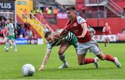 27 June 2022; Darragh Burns of St Patrick's Athletic is fouled by Andy Lyons of Shamrock Rovers during the SSE Airtricity League Premier Division match between St Patrick's Athletic and Shamrock Rovers at Richmond Park in Dublin. Photo by Piaras Ó Mídheach/Sportsfile