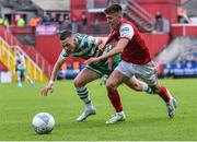 27 June 2022; Darragh Burns of St Patrick's Athletic is fouled by Andy Lyons of Shamrock Rovers during the SSE Airtricity League Premier Division match between St Patrick's Athletic and Shamrock Rovers at Richmond Park in Dublin. Photo by Piaras Ó Mídheach/Sportsfile