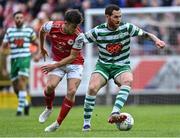 27 June 2022; Chris McCann of Shamrock Rovers in action against Adam O'Reilly of St Patrick's Athletic during the SSE Airtricity League Premier Division match between St Patrick's Athletic and Shamrock Rovers at Richmond Park in Dublin. Photo by Piaras Ó Mídheach/Sportsfile