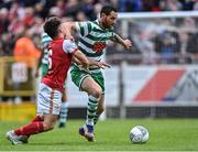 27 June 2022; Chris McCann of Shamrock Rovers in action against Adam O'Reilly of St Patrick's Athletic during the SSE Airtricity League Premier Division match between St Patrick's Athletic and Shamrock Rovers at Richmond Park in Dublin. Photo by Piaras Ó Mídheach/Sportsfile