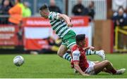 27 June 2022; Andy Lyons of Shamrock Rovers is fouled by Joe Redmond of St Patrick's Athletic during the SSE Airtricity League Premier Division match between St Patrick's Athletic and Shamrock Rovers at Richmond Park in Dublin. Photo by George Tewkesbury/Sportsfile