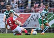 27 June 2022; Eoin Doyle of St Patrick's Athletic takes a shot under pressure from Sean Hoare, left, and Lee Grace of Shamrock Rovers during the SSE Airtricity League Premier Division match between St Patrick's Athletic and Shamrock Rovers at Richmond Park in Dublin. Photo by Piaras Ó Mídheach/Sportsfile