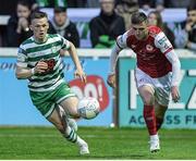 27 June 2022; Ronan Coughlan of St Patrick's Athletic in action against Andy Lyons of Shamrock Rovers during the SSE Airtricity League Premier Division match between St Patrick's Athletic and Shamrock Rovers at Richmond Park in Dublin. Photo by George Tewkesbury/Sportsfile
