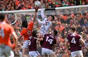 26 June 2022; Galway goalkeeper Conor Gleeson in action against Ben Crealey of Armagh during the GAA Football All-Ireland Senior Championship Quarter-Final match between Armagh and Galway at Croke Park, Dublin. Photo by Piaras Ó Mídheach/Sportsfile
