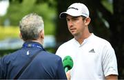 28 June 2022; Lucas Herbert of Australia speaking to RTÉ during a press conference in advance of the Horizon Irish Open Golf Championship at Mount Juliet Golf Club in Thomastown, Kilkenny. Photo by Eóin Noonan/Sportsfile