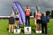26 June 2022; Athletics Ireland President John Cronin, right, and former president Ronnie Long, left, with men's triple jump medallists, from left, Jai Benson of Liverpool Harriers AC, silver, Conall Mahon of Tír Chonaill AC, Donegal, gold, and Joshua Knox of City of Lisburn AC, Down, bronze,  during day two of the Irish Life Health National Senior Track and Field Championships 2022 at Morton Stadium in Dublin. Photo by Sam Barnes/Sportsfile