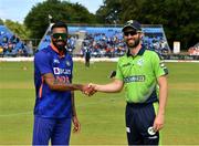 28 June 2022; Captains Hardik Pandya of India, left, and Andrew Balbirnie of Ireland shake hands before the LevelUp11 Second Men's T20 International match between Ireland and India at Malahide Cricket Club in Dublin. Photo by Sam Barnes/Sportsfile