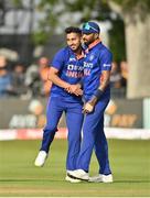 28 June 2022; Umran Malik, left, and Hardik Pandya of India celebrate the wicket of Gareth Delany of Ireland during the LevelUp11 Second Men's T20 International match between Ireland and India at Malahide Cricket Club in Dublin. Photo by Sam Barnes/Sportsfile