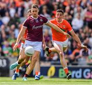 26 June 2022; Robert Finnerty of Galway in action against Rory Grugan of Armagh during the GAA Football All-Ireland Senior Championship Quarter-Final match between Armagh and Galway at Croke Park, Dublin. Photo by Ray McManus/Sportsfile