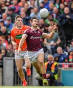 26 June 2022; Cillian McDaid of Galway in action against Jarly Óg Burns of Armagh during the GAA Football All-Ireland Senior Championship Quarter-Final match between Armagh and Galway at Croke Park, Dublin. Photo by Ray McManus/Sportsfile