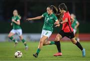 27 June 2022; Jess Ziu of Republic of Ireland in action against Lela Chichinadze of Georgia during the FIFA Women's World Cup 2023 Qualifier match between Georgia and Republic of Ireland at Tengiz Burjanadze Stadium in Gori, Georgia. Photo by Stephen McCarthy/Sportsfile