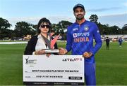 28 June 2022; Deepak Hooda of India is presented with the most valuable player of the match award by LevelUp11 director Parul Khanna during the LevelUp11 Second Men's T20 International match between Ireland and India at Malahide Cricket Club in Dublin. Photo by Sam Barnes/Sportsfile