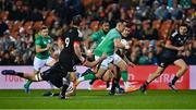29 June 2022; James Hume of Ireland is tackled by Josh Dickson of Maori All Blacks during the match between the Maori All Blacks and Ireland at the FMG Stadium in Hamilton, New Zealand. Photo by Brendan Moran/Sportsfile