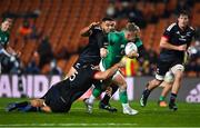 29 June 2022; Craig Casey of Ireland is tackled by Maori All Blacks players Isaia Walker-Leawere, 5, and Cameron Suafoa during the match between the Maori All Blacks and Ireland at the FMG Stadium in Hamilton, New Zealand. Photo by Brendan Moran/Sportsfile