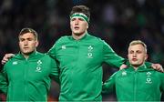 29 June 2022; Ireland debutant Joe McCarthy, centre, alongside teammates Jordan Larmour, left, and Craig Casey during the playing of the anthems before the match between the Maori All Blacks and Ireland at the FMG Stadium in Hamilton, New Zealand. Photo by Brendan Moran/Sportsfile