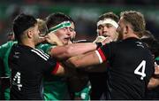 29 June 2022; Joe McCarthy of Ireland tussles with Shaun Stevenson, left, and Josh Dickson of Maori All Blacks tussle during the match between the Maori All Blacks and Ireland at the FMG Stadium in Hamilton, New Zealand. Photo by Brendan Moran/Sportsfile