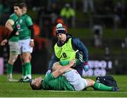 29 June 2022; Cian Healy of Ireland holds his ankle as he receives medical attention for an injury during the match between the Maori All Blacks and Ireland at the FMG Stadium in Hamilton, New Zealand. Photo by Brendan Moran/Sportsfile