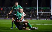 29 June 2022; Keith Earls of Ireland is tackled by Billy Proctor of Maori All Blacks during the match between the Maori All Blacks and Ireland at the FMG Stadium in Hamilton, New Zealand. Photo by Brendan Moran/Sportsfile