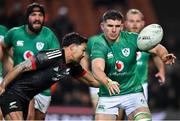 29 June 2022; Nick Timoney of Ireland is tackled by Billy Proctor of Maori All Blacks as he gets a pass away during the match between the Maori All Blacks and Ireland at the FMG Stadium in Hamilton, New Zealand. Photo by Brendan Moran/Sportsfile