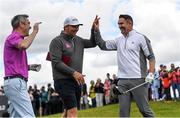 29 June 2022; Former Republic of Ireland footballer Robbie Keane celebrates with golfer Marcus Armitage, centre, and actor Jimmy Nesbitt, left, after his drive during the Horizon Irish Open Golf Championship Pro-Am at Mount Juliet Golf Club in Thomastown, Kilkenny. Photo by Eóin Noonan/Sportsfile