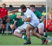 29 June 2022; Tiaan Lange of South Africa is tackled by Diarmuid Mangan of Ireland during the Six Nations U20 summer series match between Ireland and South Africa at Payanini Centre in Verona, Italy. Photo by Roberto Bregani/Sportsfile