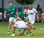 29 June 2022; Patrick Campbell of Ireland is tackled by Nico Steyn of South Africa during the Six Nations U20 summer series match between Ireland and South Africa at Payanini Centre in Verona, Italy. Photo by Roberto Bregani/Sportsfile