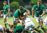 29 June 2022; Reuben Crothers of Ireland is tackled by Neil Le Roux of South Africa during the Six Nations U20 summer series match between Ireland and South Africa at Payanini Centre in Verona, Italy. Photo by Roberto Bregani/Sportsfile