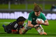 29 June 2022; Cian Prendergast of Ireland is tackled by Bailyn Sullivan of Maori All Blacks during the match between the Maori All Blacks and Ireland at the FMG Stadium in Hamilton, New Zealand. Photo by Brendan Moran/Sportsfile