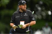 30 June 2022; Shane Lowry of Ireland consults his yardage book during day one of the Horizon Irish Open Golf Championship at Mount Juliet Golf Club in Thomastown, Kilkenny. Photo by Eóin Noonan/Sportsfile