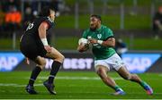 29 June 2022; Bundee Aki of Ireland in action against Tyrone Thompson of Maori All Blacks during the match between the Maori All Blacks and Ireland at the FMG Stadium in Hamilton, New Zealand. Photo by Brendan Moran/Sportsfile