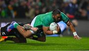 29 June 2022; Bundee Aki of Ireland on the way to scoring his side's first try during the match between the Maori All Blacks and Ireland at the FMG Stadium in Hamilton, New Zealand. Photo by Brendan Moran/Sportsfile
