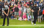 30 June 2022; Seamus Power of Ireland putts for birdie on the ninth green as Shane Lowry of Ireland watches on during day one of the Horizon Irish Open Golf Championship at Mount Juliet Golf Club in Thomastown, Kilkenny. Photo by Eóin Noonan/Sportsfile