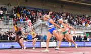 26 June 2022; Molly Scott of St Laurence O'Toole AC, Carlow, centre, dips for the line to finish second in the women's 100m final, behind Rhasidat Adeleke of Tallaght AC, Dublin, far left, during day two of the Irish Life Health National Senior Track and Field Championships 2022 at Morton Stadium in Dublin. Photo by Sam Barnes/Sportsfile