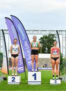 26 June 2022; Women's 1500m medallists, from left, Maisy O'sullivan of St Abbans AC, Carlow, silver, Carla Sweeney of Rathfarnham WSAF AC, Dublin, gold, and Niamh Margarete Markham of Ennis Track AC, Clare, bronze, during day two of the Irish Life Health National Senior Track and Field Championships 2022 at Morton Stadium in Dublin. Photo by Sam Barnes/Sportsfile