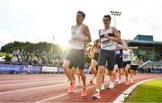 26 June 2022; Paul Robinson of St Coca's AC, Kildare, left, and Louis O'Loughlin of Donore Harriers, Dublin, lead the field whilst competing in the men's 1500m during day two of the Irish Life Health National Senior Track and Field Championships 2022 at Morton Stadium in Dublin. Photo by Sam Barnes/Sportsfile