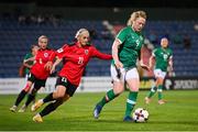 27 June 2022; Amber Barrett of Republic of Ireland in action against Mariam Kalandadze of Georgia during the FIFA Women's World Cup 2023 Qualifier match between Georgia and Republic of Ireland at Tengiz Burjanadze Stadium in Gori, Georgia. Photo by Stephen McCarthy/Sportsfile