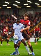 1 July 2022; James Akintunde of Derry City in action against Rory Feely of Bohemians during the SSE Airtricity League Premier Division match between Bohemians and Derry City at Dalymount Park in Dublin. Photo by Sam Barnes/Sportsfile