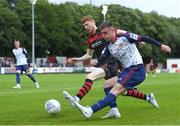 1 July 2022; Ben McCormack of St Patrick's Athletic in action against Darragh Nugent of Drogheda United during the SSE Airtricity League Premier Division match between St Patrick's Athletic and Drogheda United at Richmond Park in Dublin. Photo by George Tewkesbury/Sportsfile